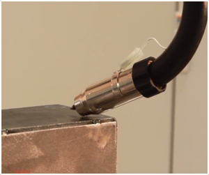 a photograph of a nozzle sensing set-up