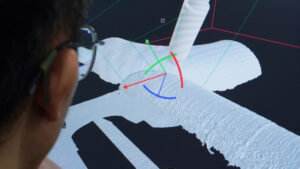 An Augmentus engineer uses the AutoEdge function to plan precise robot motion along a seam.